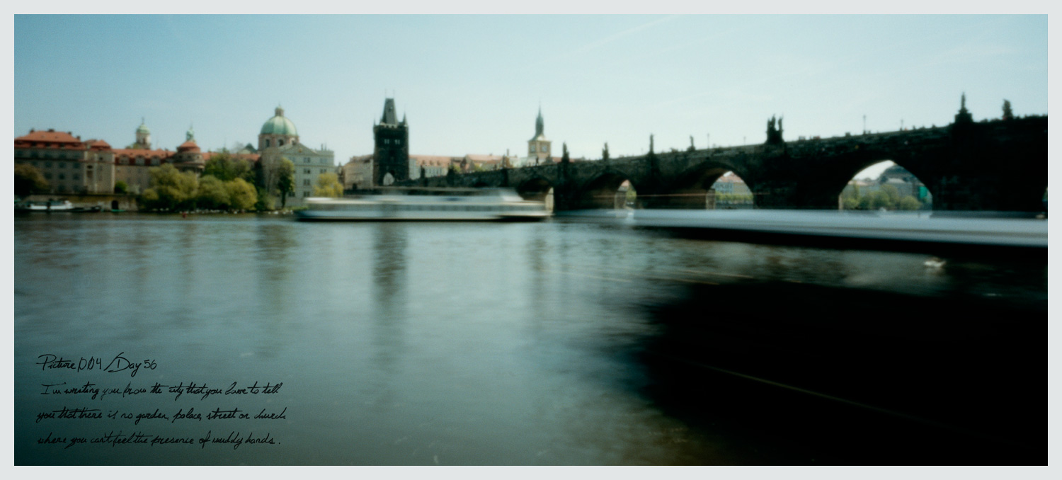 A photograph of terrace next to Charles Bridge terrace next to Charles Bridge